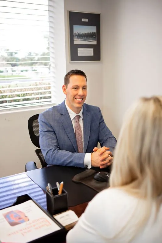 Dr. Eberlin consulting with a patient in the Walnut Creek office